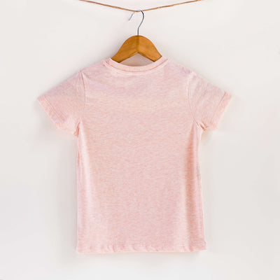 Camiseta rosa de algodón orgánico para niños, estampado a mano con tintas ecológicas. Modelo unisex.